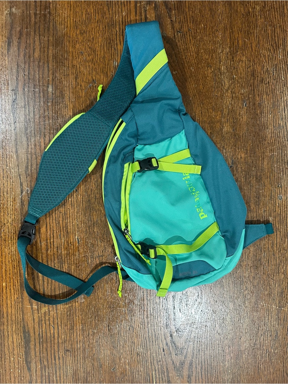 Patagonia Atom Sling Bag 8L in Teal and Lime Green